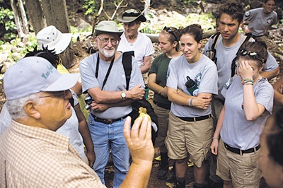 Every Saturday, a crew of volunteers goes to work and learn in Honokowai Valley. Photo: Ray Mangan